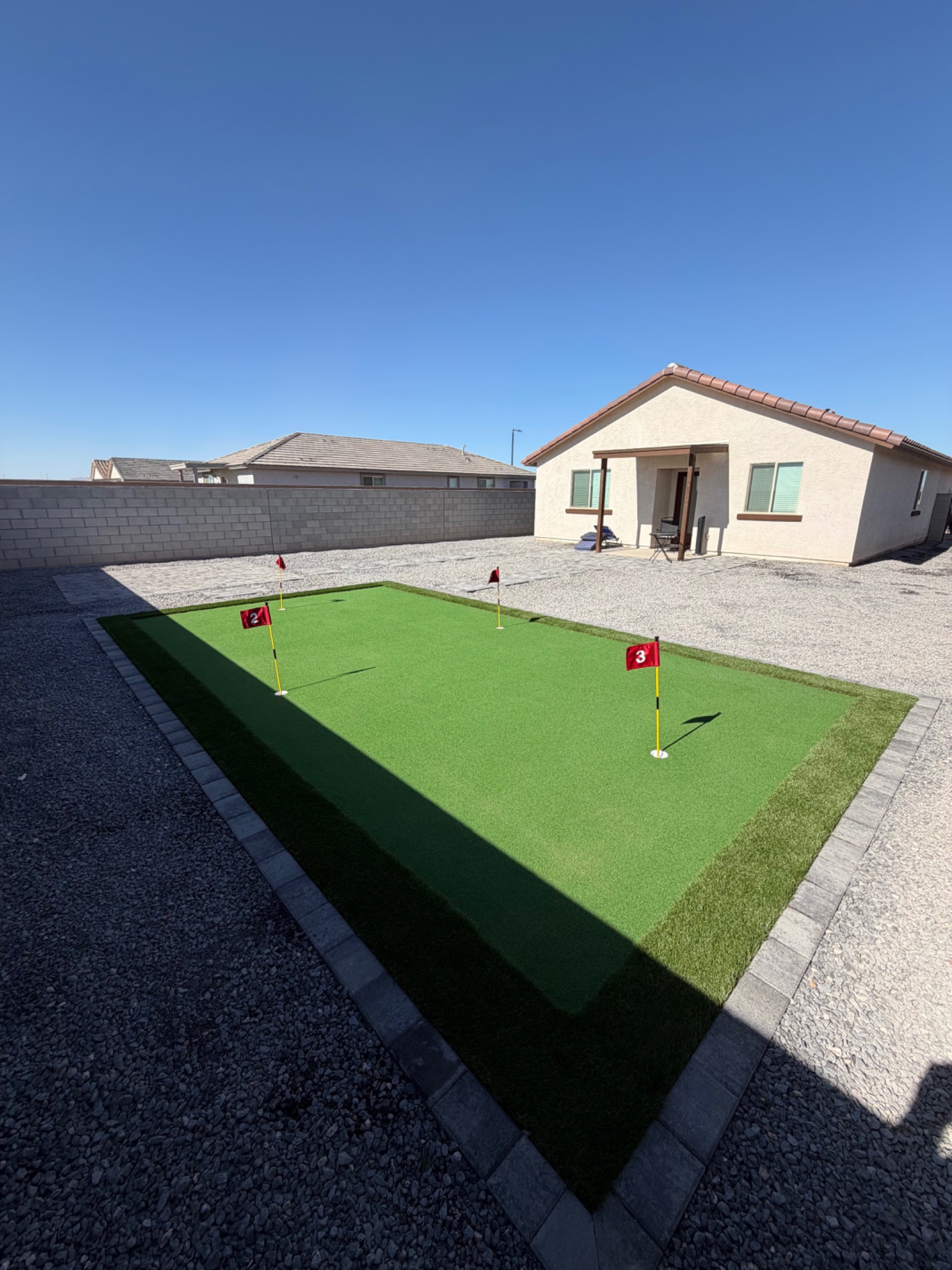 Large custom multi-hole backyard putting green